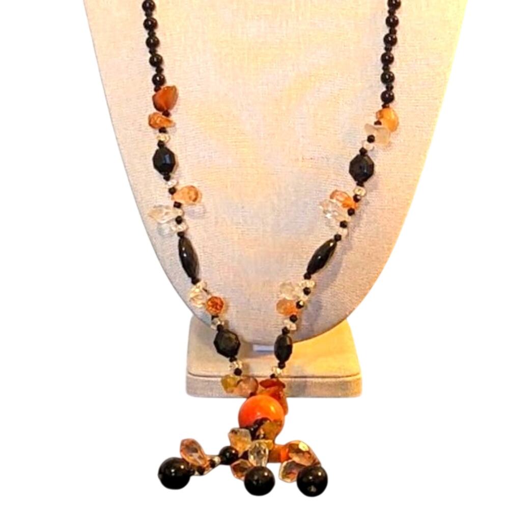 Black bead orange ball tassel necklace